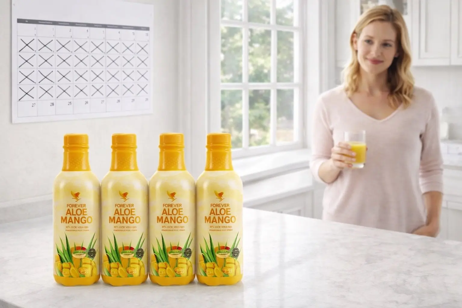Vier Flaschen Forever Aloe Mango in der 4-Pack-Packung